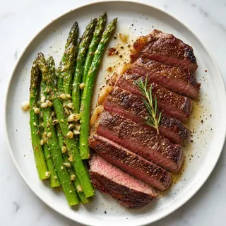 Pan Seared Sirloin with Asparagus and Garlic
